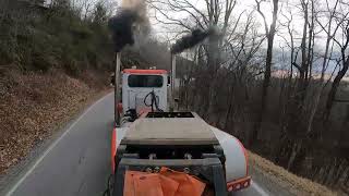 625hp cat powered Peterbilt 379 pulling lowboy in the mountains, loud straight pipes & jake brakes!!