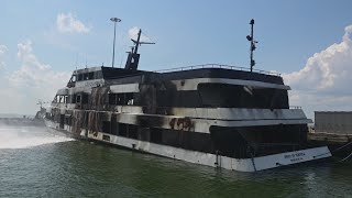 Smoldering Spirit of Norfolk being dewatered, considered a loss