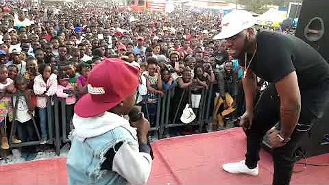 SlapDee On Stage With A Young Rapper Fly J