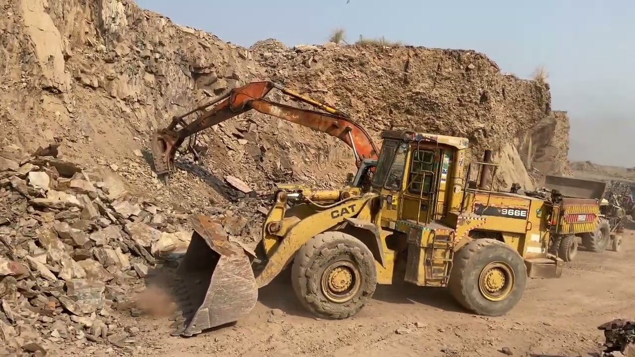 CAT 966D Loader Extreme Construction Work with Heavy Rocks