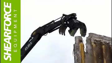ShearForce SP20V Pulverizer At Work Demolishing Brick and Concrete Building