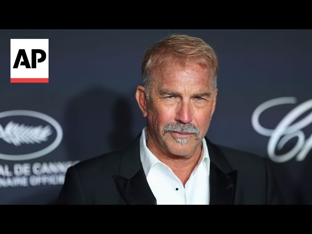 Kevin Costner prefers writing to posing