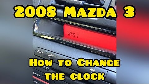 How to change or adjust the clock in a 2008 Mazda 3