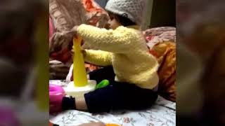 Learn size and colour with the help of stacking rings toy.