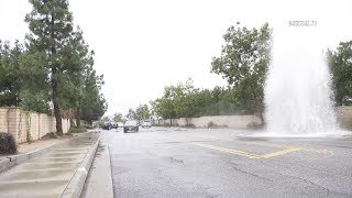 Sheared Hydrant Floods Already Wet Roads