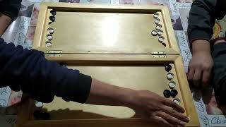 : The game of backgammon is long A  72       