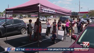 Midstate Verizon stores hold backpack giveaway