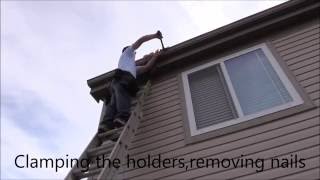 DIY. One man  removing and installing a gutter