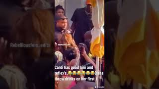 Fans throw drink on cardi , she responds shorts cardib cardi reaction drink share shortvideo