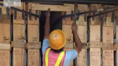 How to loading the glass or mirror into the container?