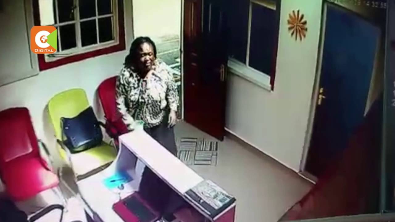 Woman caught on camera stealing a laptop from a Nairobi school - YouTube