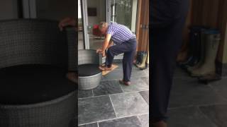 User attempting to use a boot jack for the first time