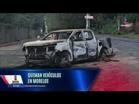 Queman vehículos y retienen a tres policías durante operativo en Morelos