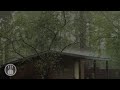 Sound of Rain with a Thunderstorm in the Garden. Rain Falls on the Tin Roof of a Small Barn.