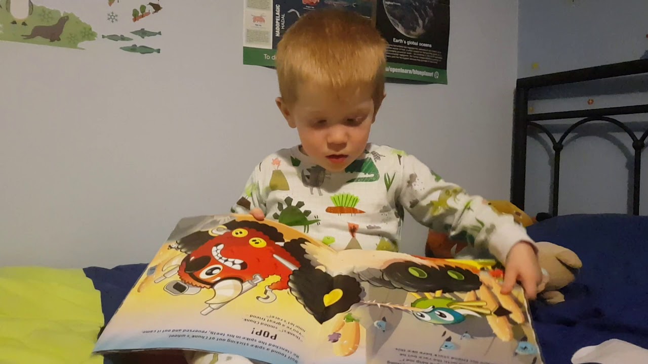 T reads Monster Trucks: The Big Race by Jon Hinton and TADO! - YouTube