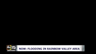 RIVER OVERPOWERS DRIVERS ON ROAD -- EXTREME FLOODING in Rainbow Valley area of Arizona