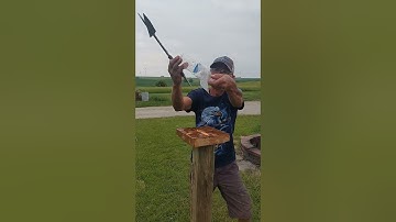 SLICING UP SOME BOTTLES WITH MY ‎@wyatthines153  CUSTOM THROWING AXE AFTER PUTTING MY EDGE ON IT