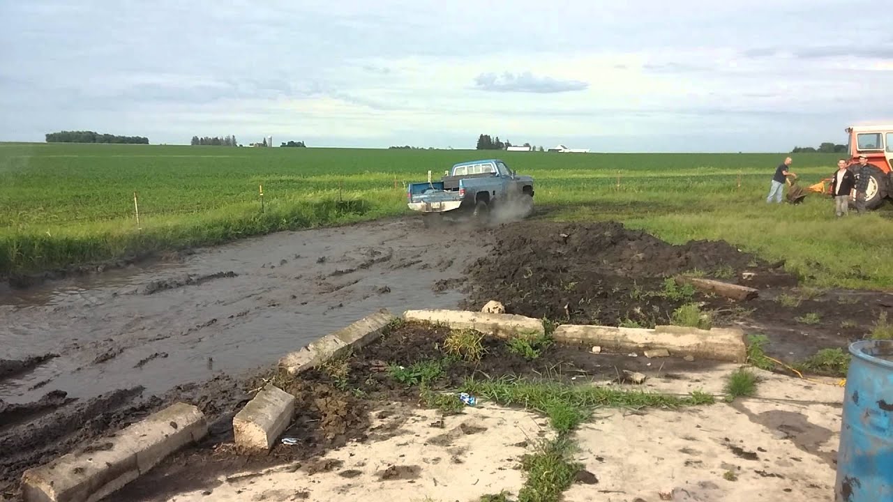 Mudding in iowa homemade hole