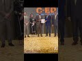 receiving the best teacher award from Concordia colleges a project of beacon house