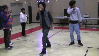 Larry from Les Twins KILLIN the beat and a hot dog at the same time!