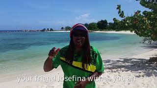 Rastaman send birthday greetings from a Jamaican beach
