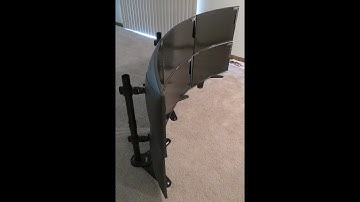 Trading setup:  6 Asus 32 inch curved monitors on vertical mount poles