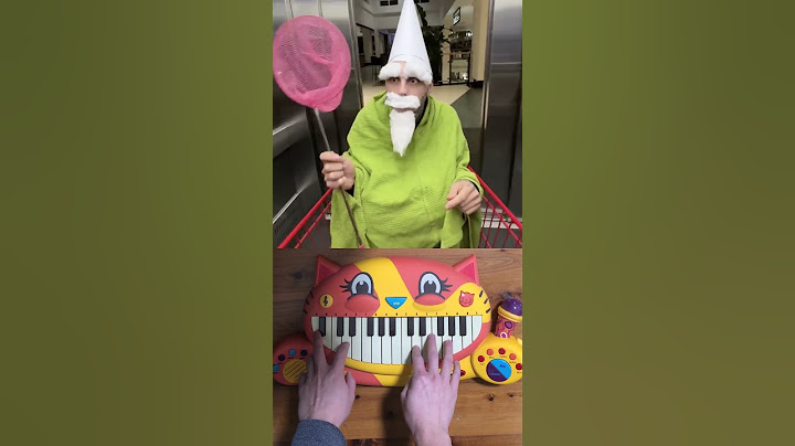 Green WIzard Gnome Meme on Cat Piano