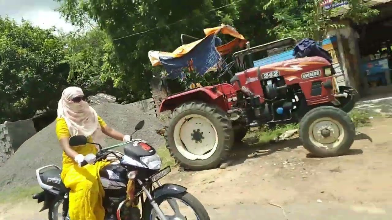 Bike riding by woman / Bike riding wearing saree gloves and scurf