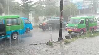 Heavy rain accompanied by wind pounded the streets of this city