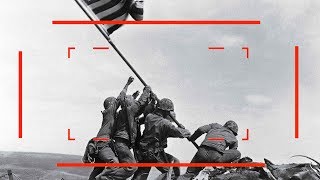 Soldier Raising The Soviet Flag Over The Reichstag