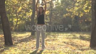 Stock Footage - Young Girl Doing A Workout In The Forest Videohive