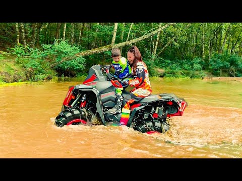 Den Ride on Cross Bike in the park and Mom's Monster Quad Bike in the river