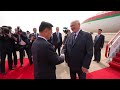 Kim Jong Un greets Belarus' Lukashenko as he arrives in North Korea