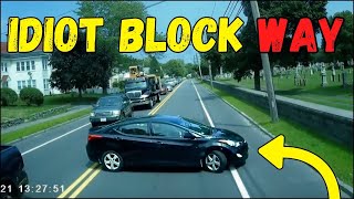 IDIOT LEARNS WHY HE SHOULDN'T CUT OFF A SEMI TRUCK DRIVER