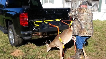 How to load a deer or hog by yourself onto a truck or four wheeler. Game Handlers