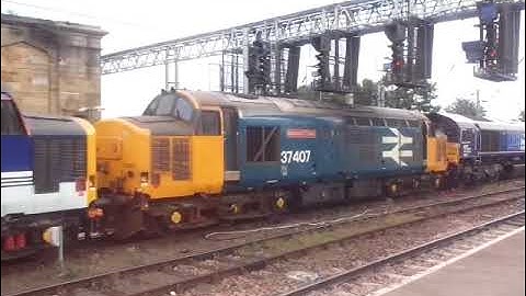 The Direct Rail Services (DRS) are Class 66 and x2 Class 37 was leaving at Carlisle Citadel Station.