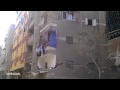 Watch dramatic moment tower block collapses in shower of dust and rubble