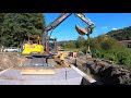 Setting up a small bridge with excavator Volvo EW160 / 4K