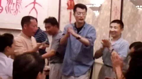 Breaking a chopstick with a dollar bill.