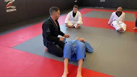 Lapel Arm Trap Americana from Side Control