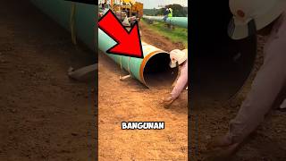 Workers freak out as a monster gets stuck in a pipe Workers freak out as a monster gets stuck in a pipe