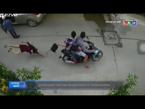 Camera nóng | 2 tên cướp táo tợn lôi nạn nhân té xuống đường | LONG AN TV