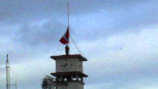Lowering the Flag to Half Mast for Islander