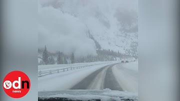 Video captures astonishing avalanche covering highway with snow in US