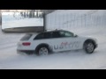 Audi A4 Allroad climbs up a small ski slope