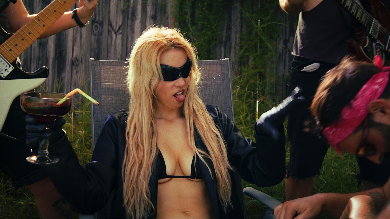 BRAT DEBUTS NEW MUSIC VIDEO “SPIT ON HIS GRAVE”