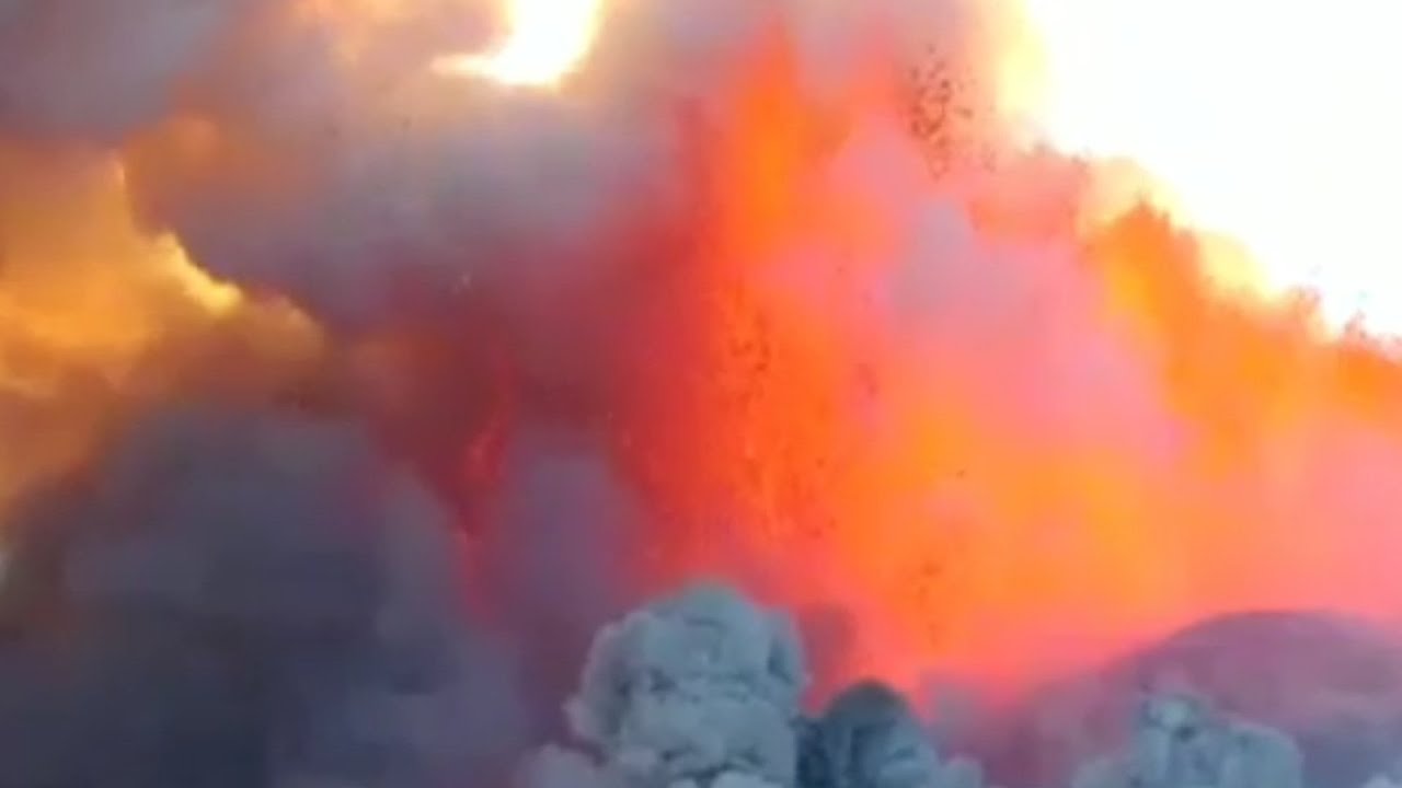 Etna volcano update:spectacular lava fountains and lava flow;Mount Etna volcano eruption, Italy