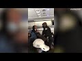 'I am a Queen of California and you people are going extinct': Black passenger is escorted off plane by police in Sacramento after launching racial rant when asked to take her seat