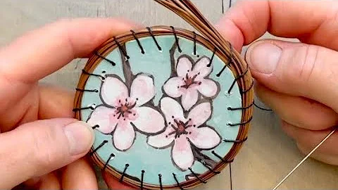 Start a pine needle basket on a drilled base