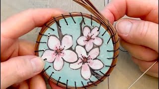 Start a pine needle basket on a drilled base